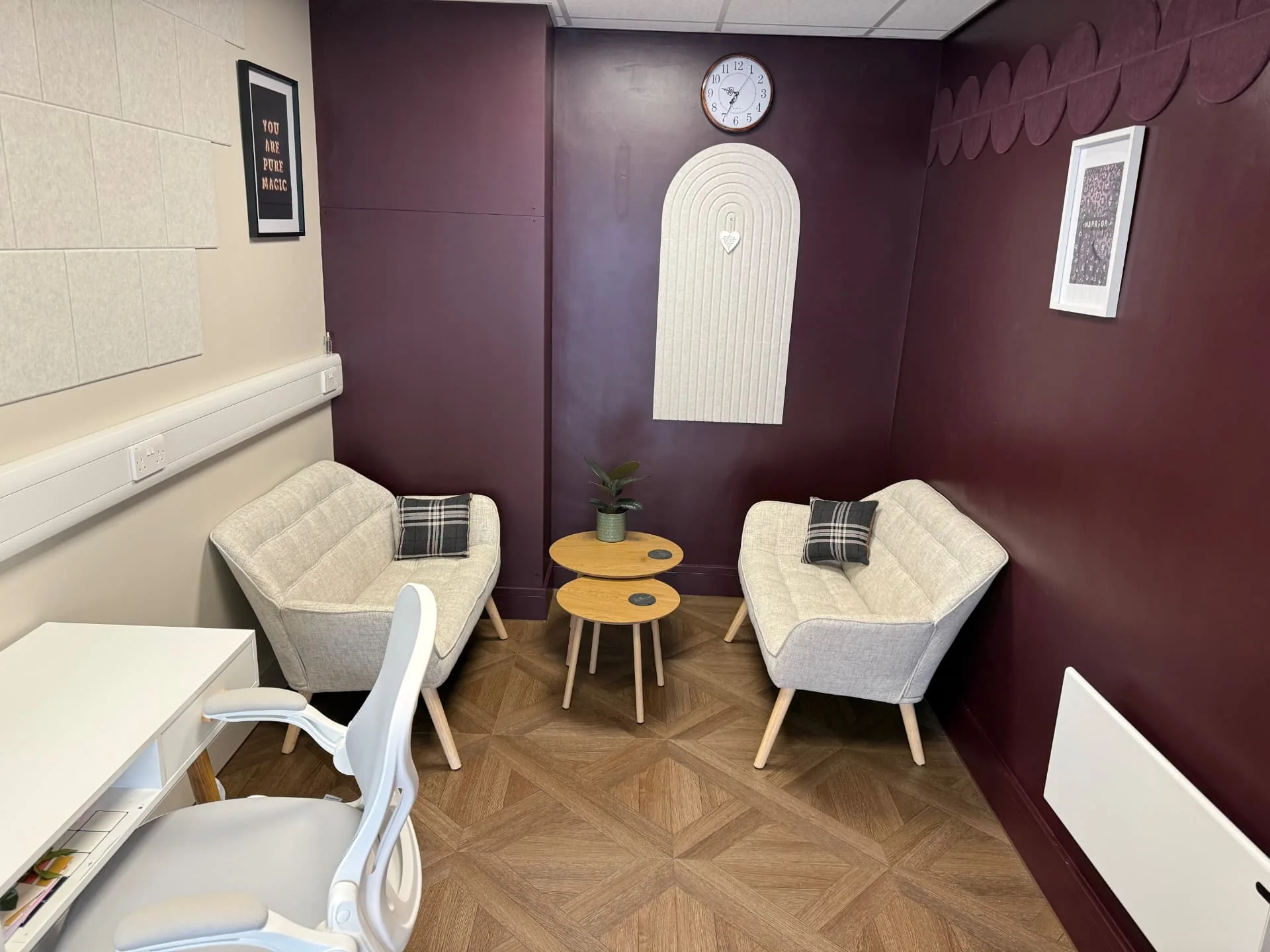 The Rowan Room at The Wellness Lounge Leeds, a quiet talking therapy space with two armchairs facing each other