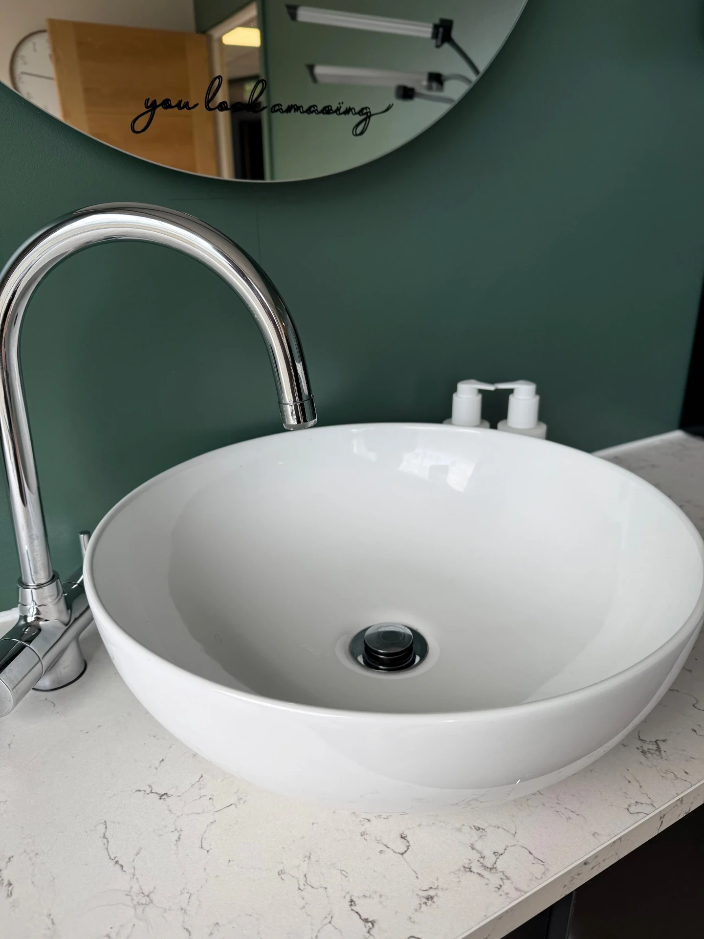 Wash basin in the Ash Room at The Wellness Lounge Leeds with hot and cold taps and Tropic hand wash and hand cream